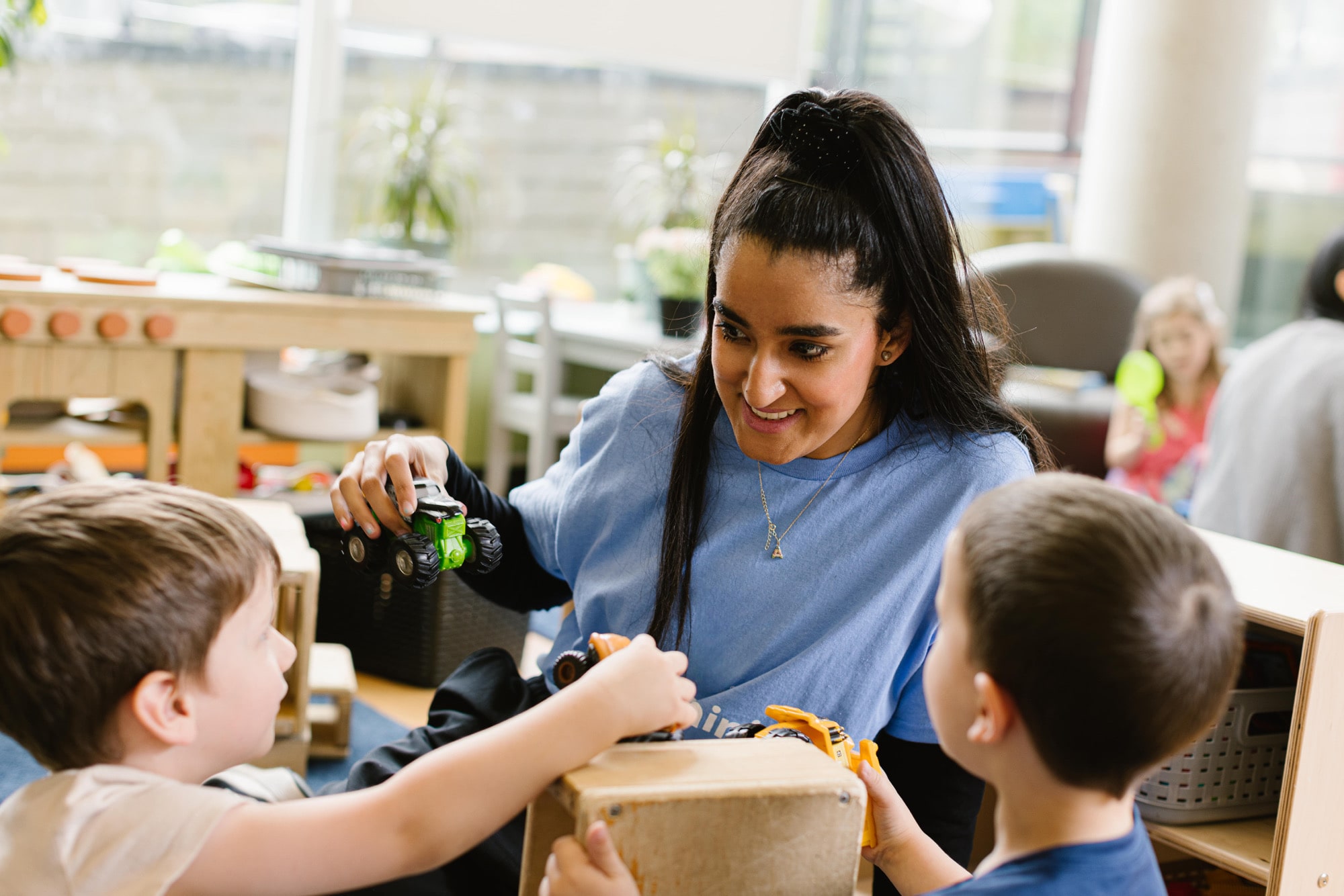 Social and emotional support professional working with a young child