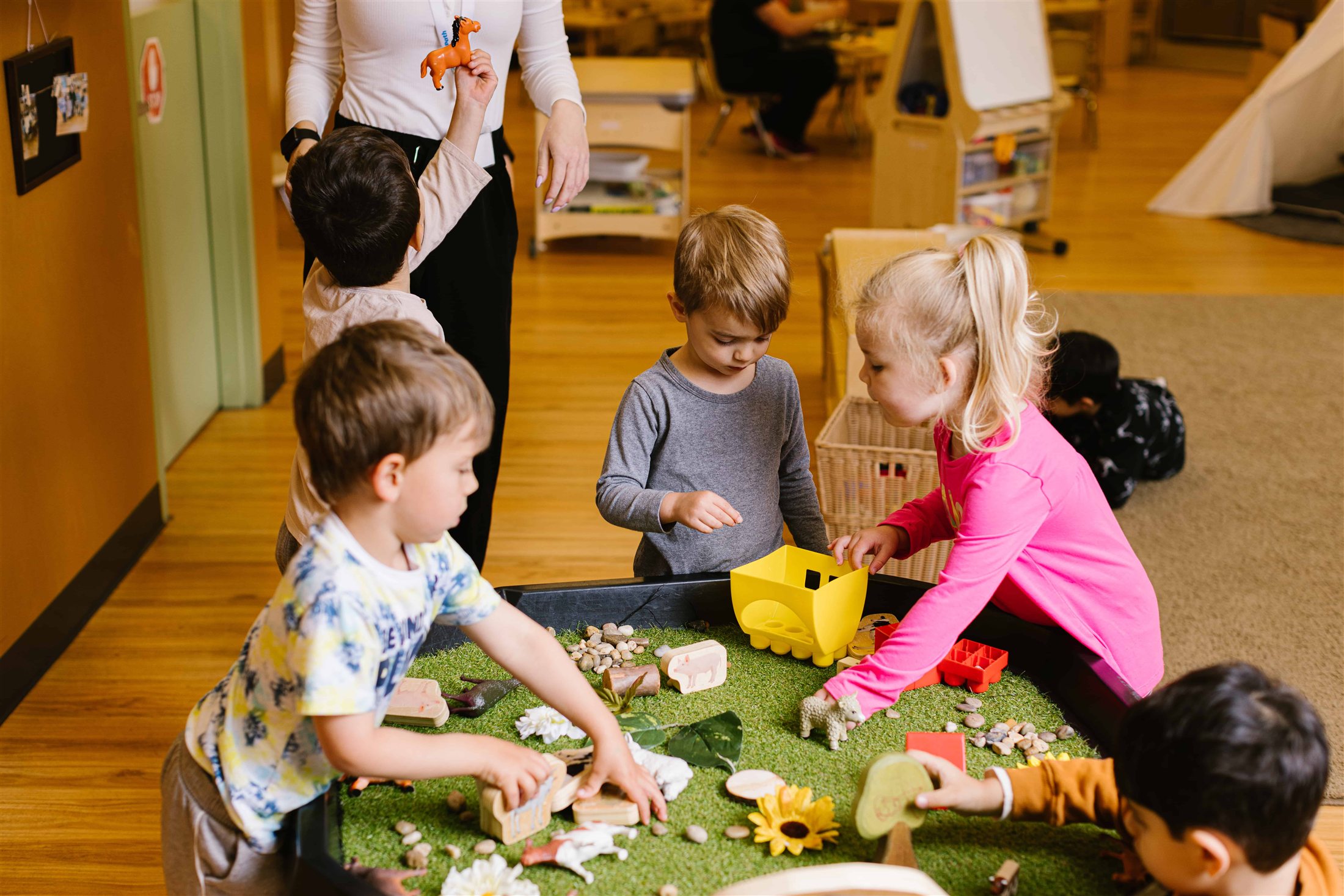 Children learning with an educator in Marlborough Day Nursery Early Childhood Support Services
