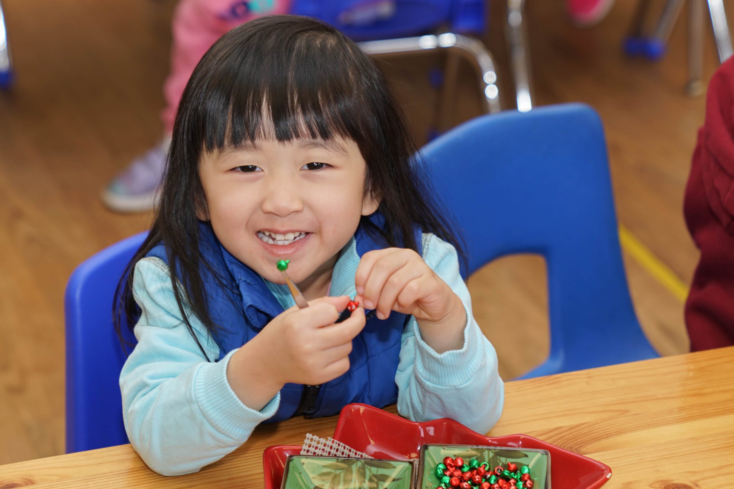 Smiling child enjoying an early learning program in Alberta
